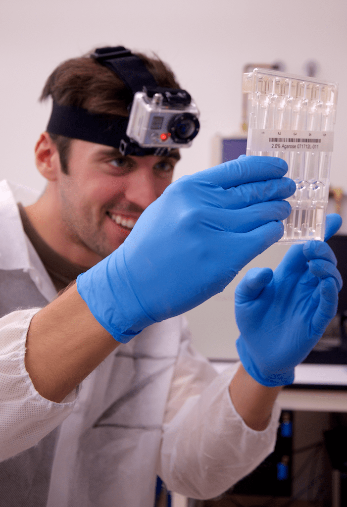 Student in Lab wearing a Go Pro camera