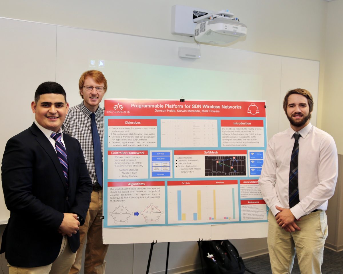 Dawson Heide, Kerwin Mercado, and Mark Powers with Presentation Poster